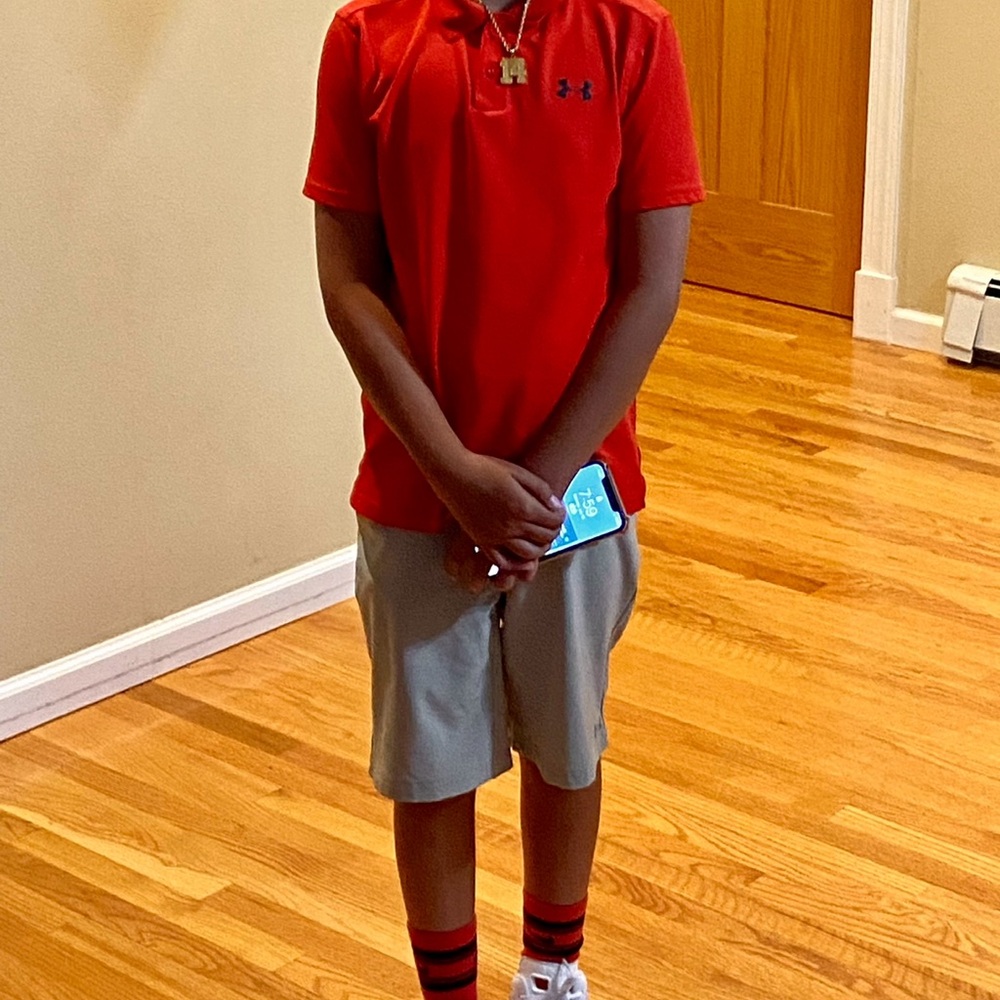 Boys Under Armour Matchplay polo, boys med, gentle used.